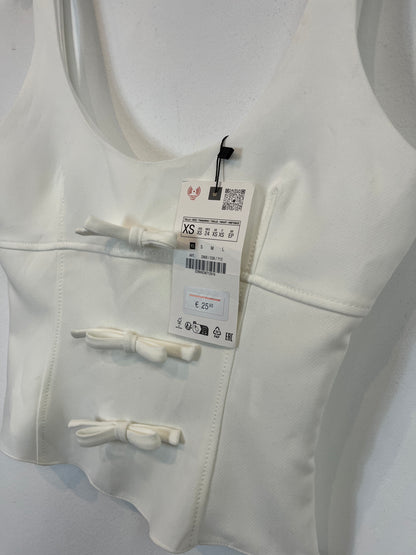 ZARA. Top blanco lazos. T.XS