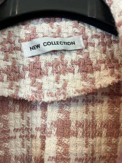 NEW COLLECTION. Chaleco tweed rosa y beige T.u(s)