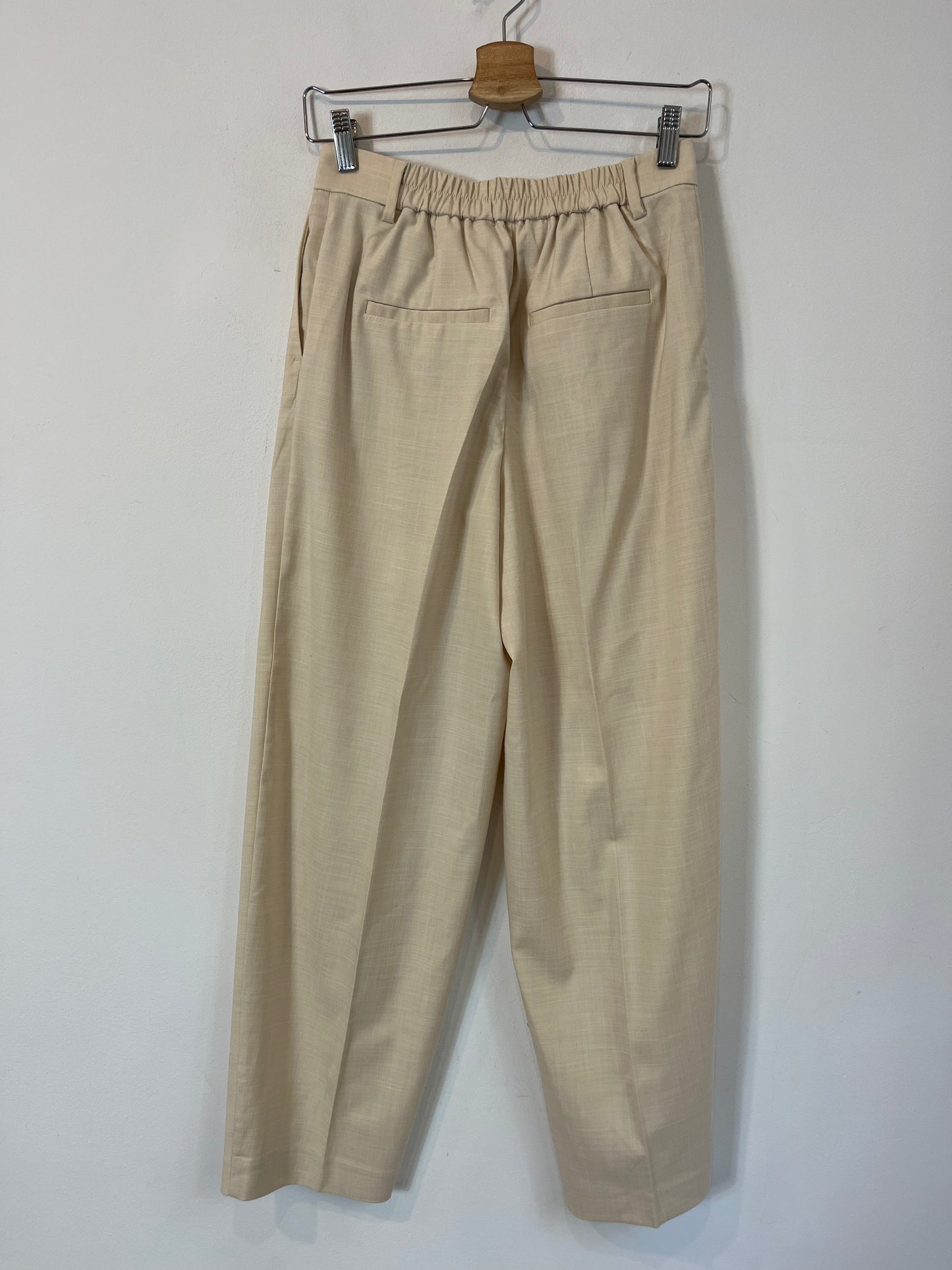 SELECTED. Flowing beige pleated trousers, size 34