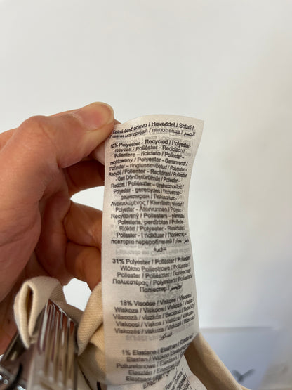 SELECTED. Flowing beige pleated trousers, size 34