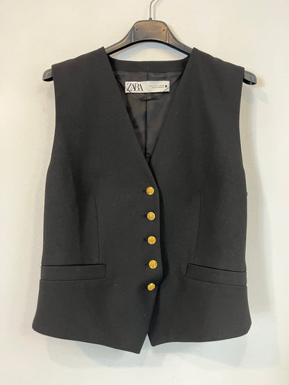 ZARA. Chaleco negro botones dorados. T S