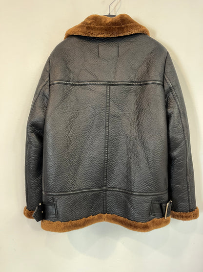 ZARA. Biker negra textura. T S