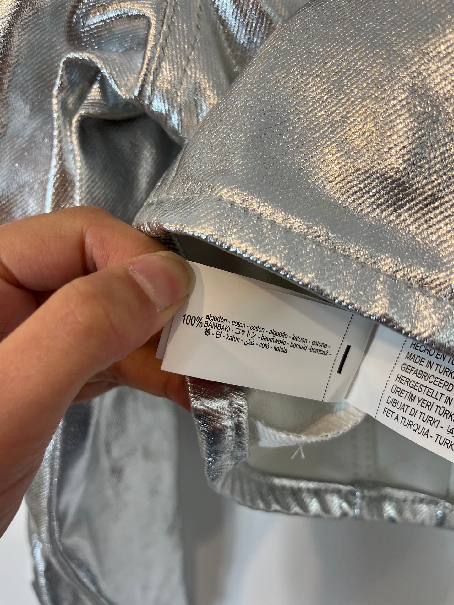 ZARA. Cazadora plateada. T S