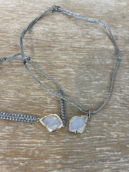 ESE O ESE. Conjunto pulsera y collar piedra regulable