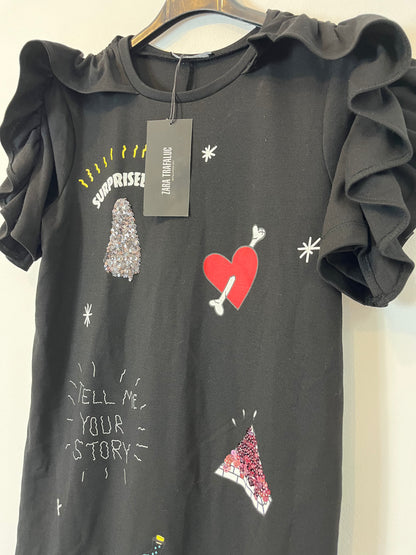 ZARA. Vestido corto dibujos. T. S.