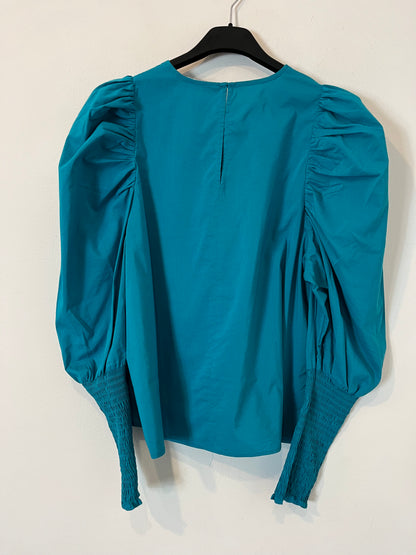 ZARA. Blusa azul turquesa detalle puños. T S
