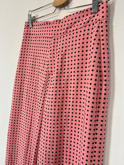 ZARA. Pantalón rosa lunares. T S