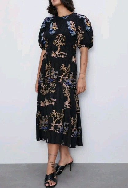 ZARA. Vestido midi negro con bordados florales
