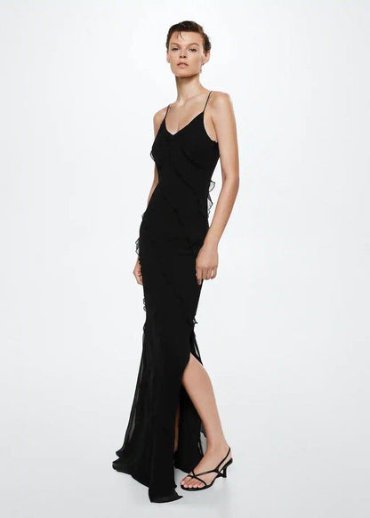 MANGO. Vestido largo negro con tirantes finos y detállele volantes
