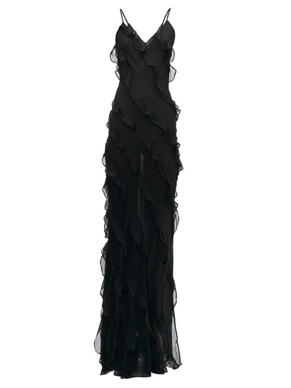 MANGO. Vestido largo negro con tirantes finos y detállele volantes