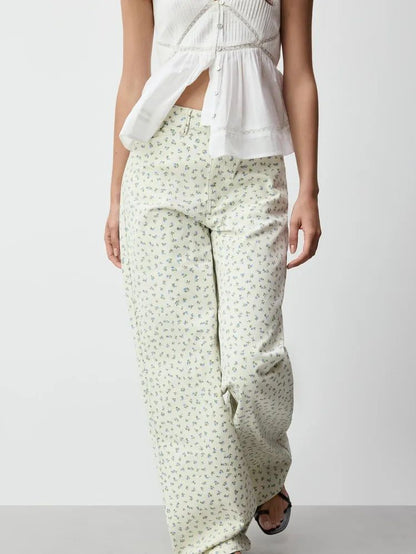 H&M. Pantalón blanco detalle flores