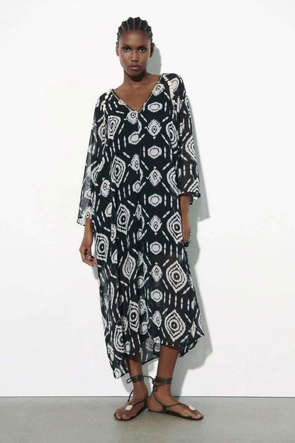 ZARA. Vestido kaftán azul estampado