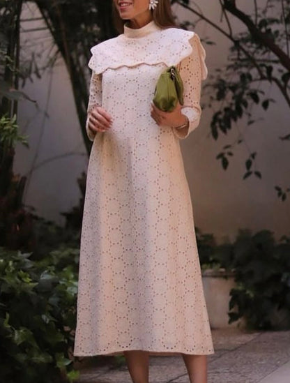 COOSY. Vestido midi rosa claro troquelado