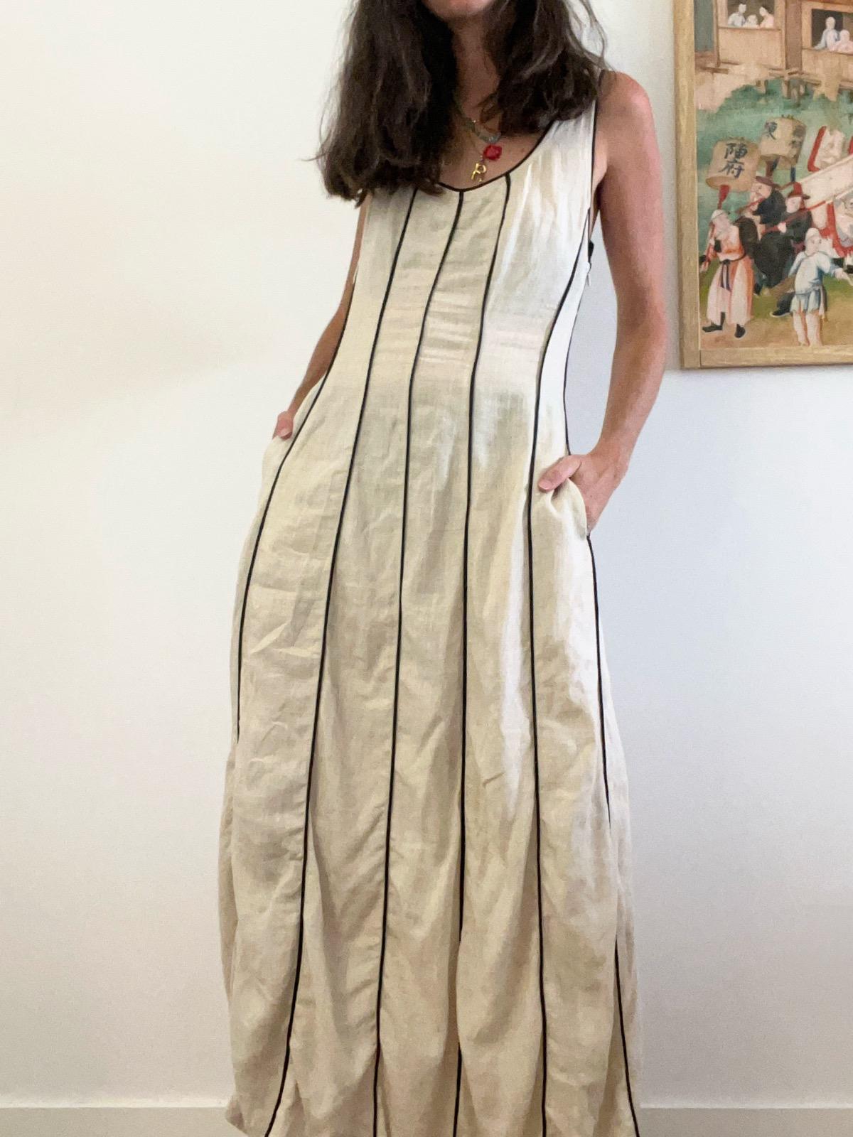 Vestido largo beige detalles negros