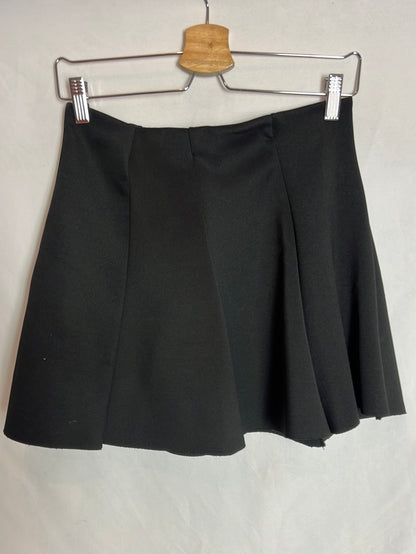 BERSHKA. Falda negra elástica T.l