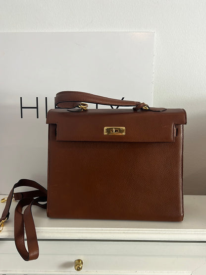 OTRAS. Bolso rígido marrón vintage.