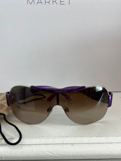 CHANEL. Purple-rimmed glasses