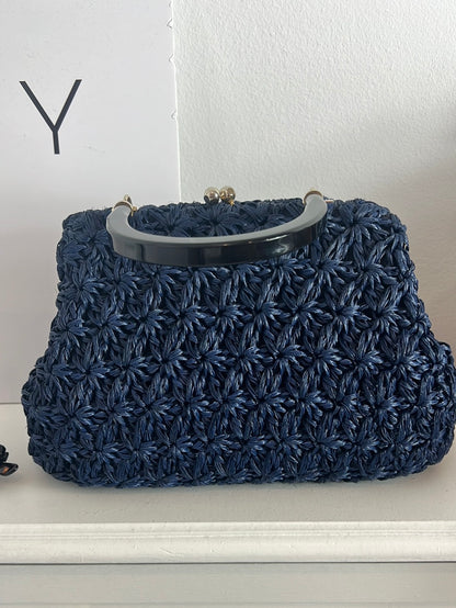 OTRAS. Bolso flores croché