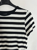 H&M. Camiseta rayas blancas y negras. T M