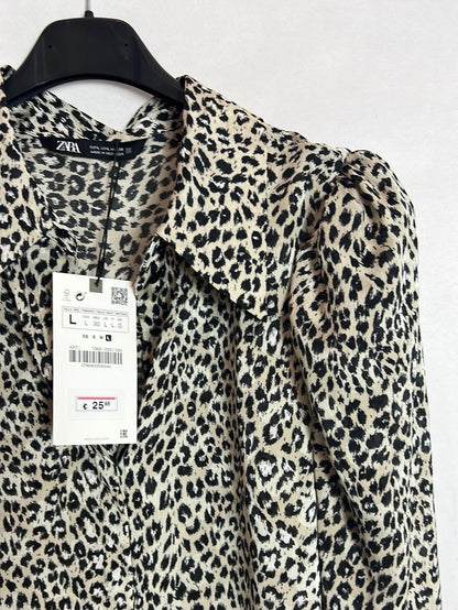 ZARA. Animal print blouse with puffed sleeves. TL