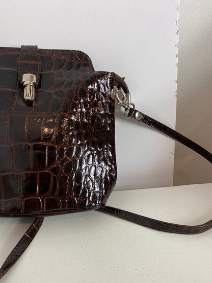 OTROS. Bandolera marrón piel