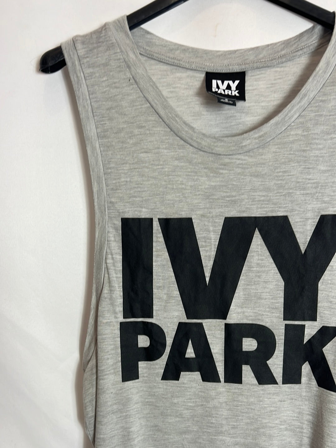 IVY PARK. Grey top with black lettering. TS
