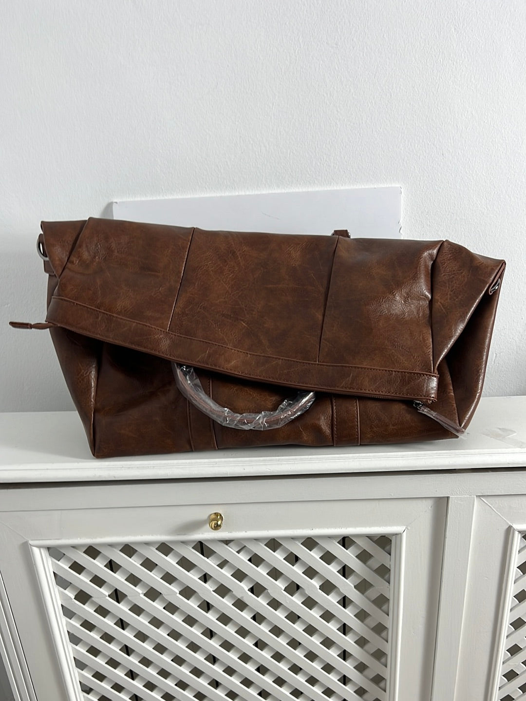 PIER ONE. Faux leather travel bag