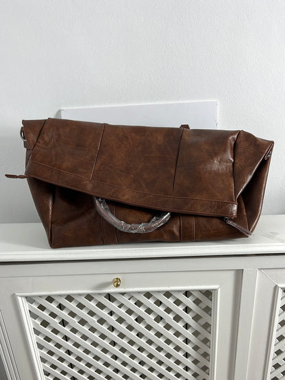 PIER ONE. Faux leather travel bag