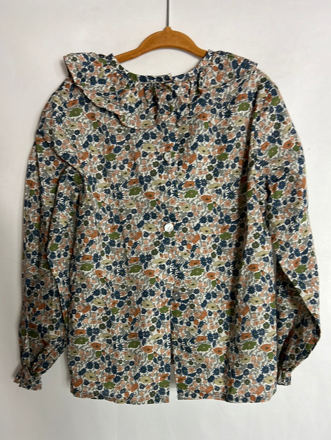 REGINA FOR KIDS. Blusa flores mini tonos azules y marrones. T 6 años