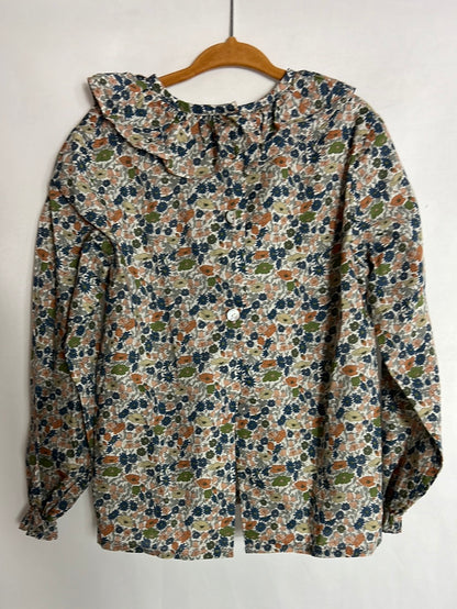 REGINA FOR KIDS. Blusa flores mini tonos azules y marrones. T 6 años