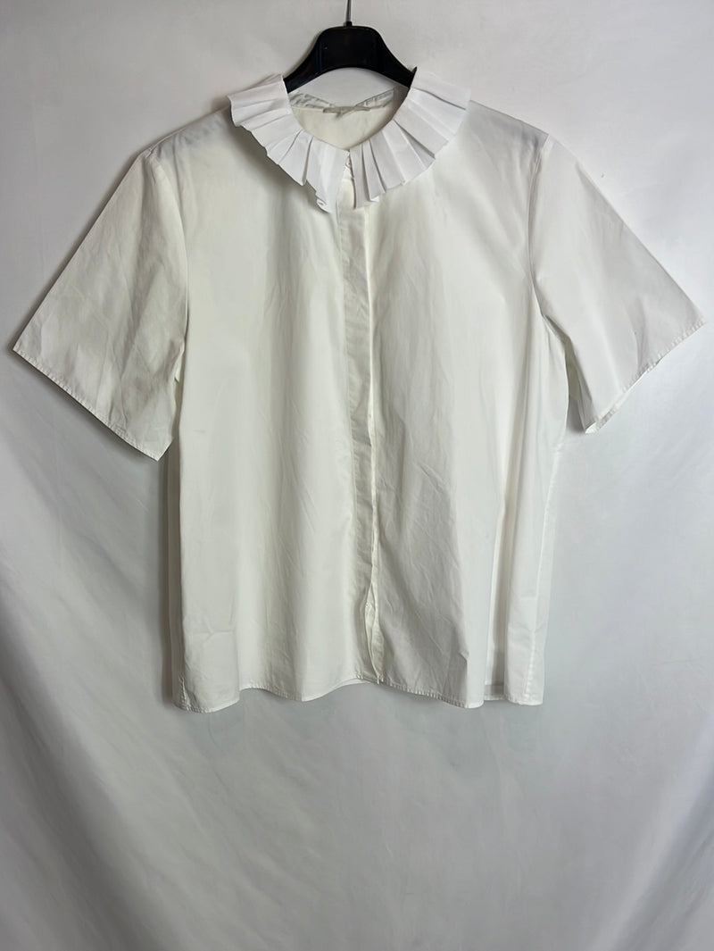 COS. Blusa blanca oversized detalle cuello. T M