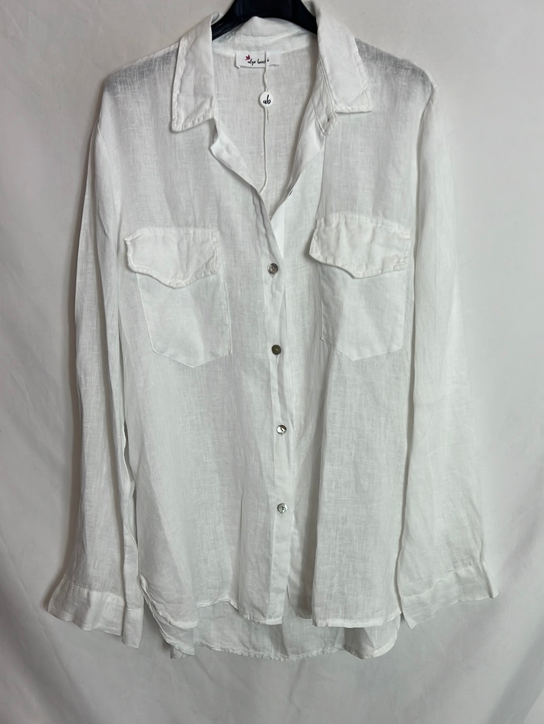 ALGO BONITO. Blusa lino blanco bolsillos. T M