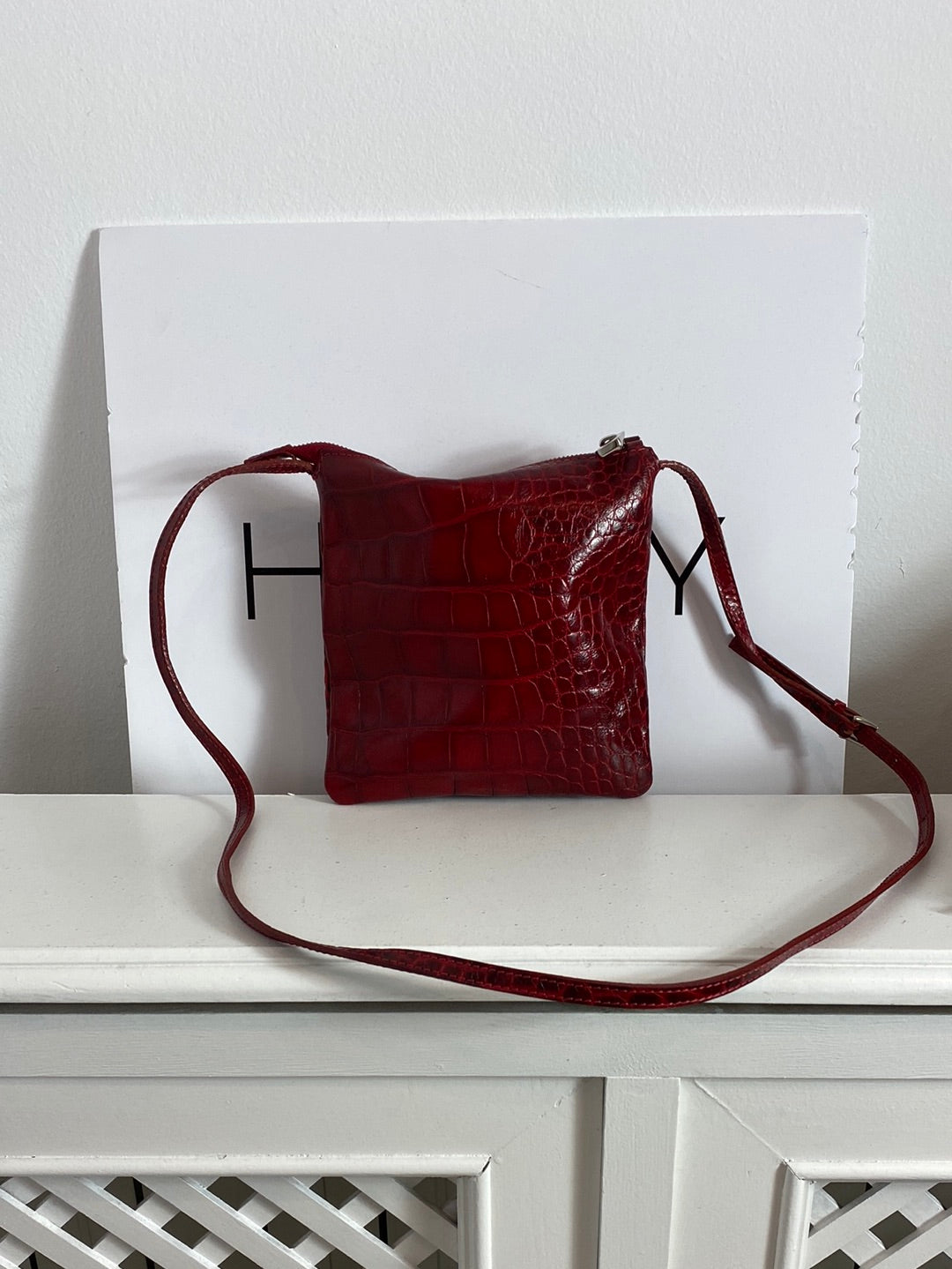 COCCINELLE. Red leather shoulder bag
