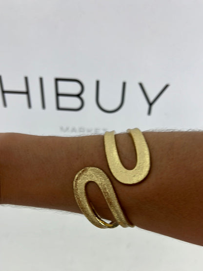 OTRAS. Pulsera dorada cruzada