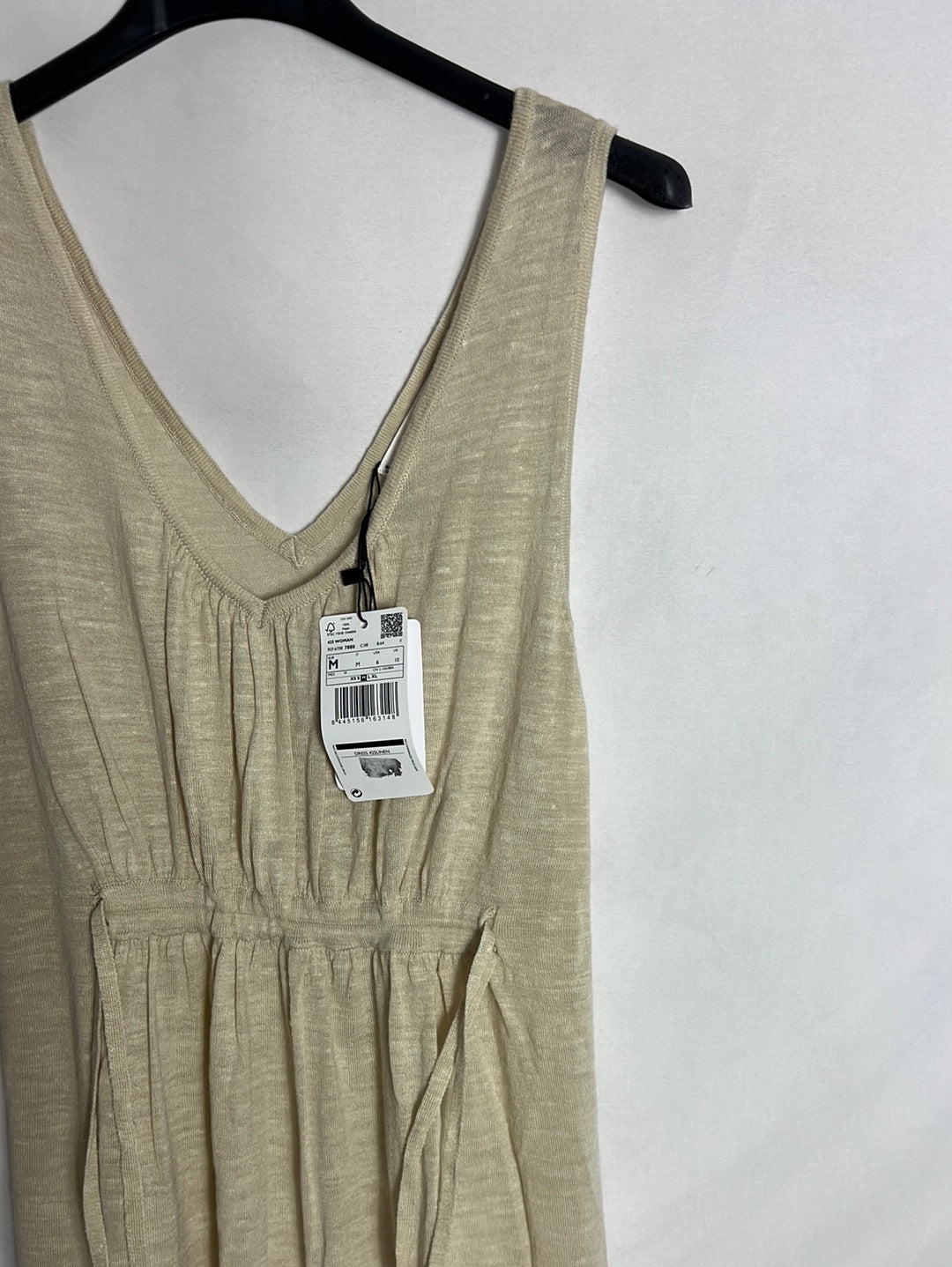 MANGO. Vestido midi beige volante. T M