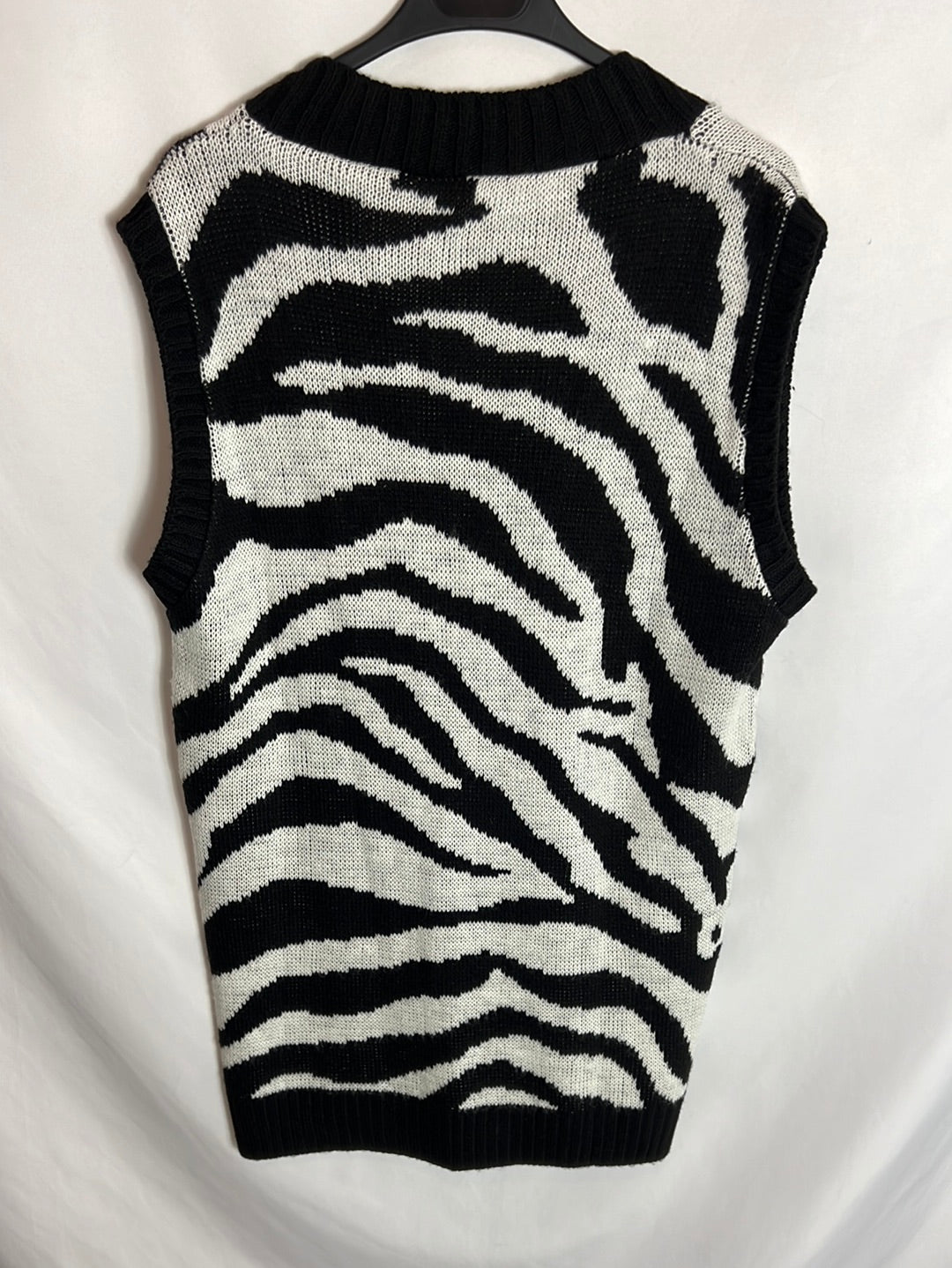 OTRAS. Chaleco estampado cebra.T.u(s/m)