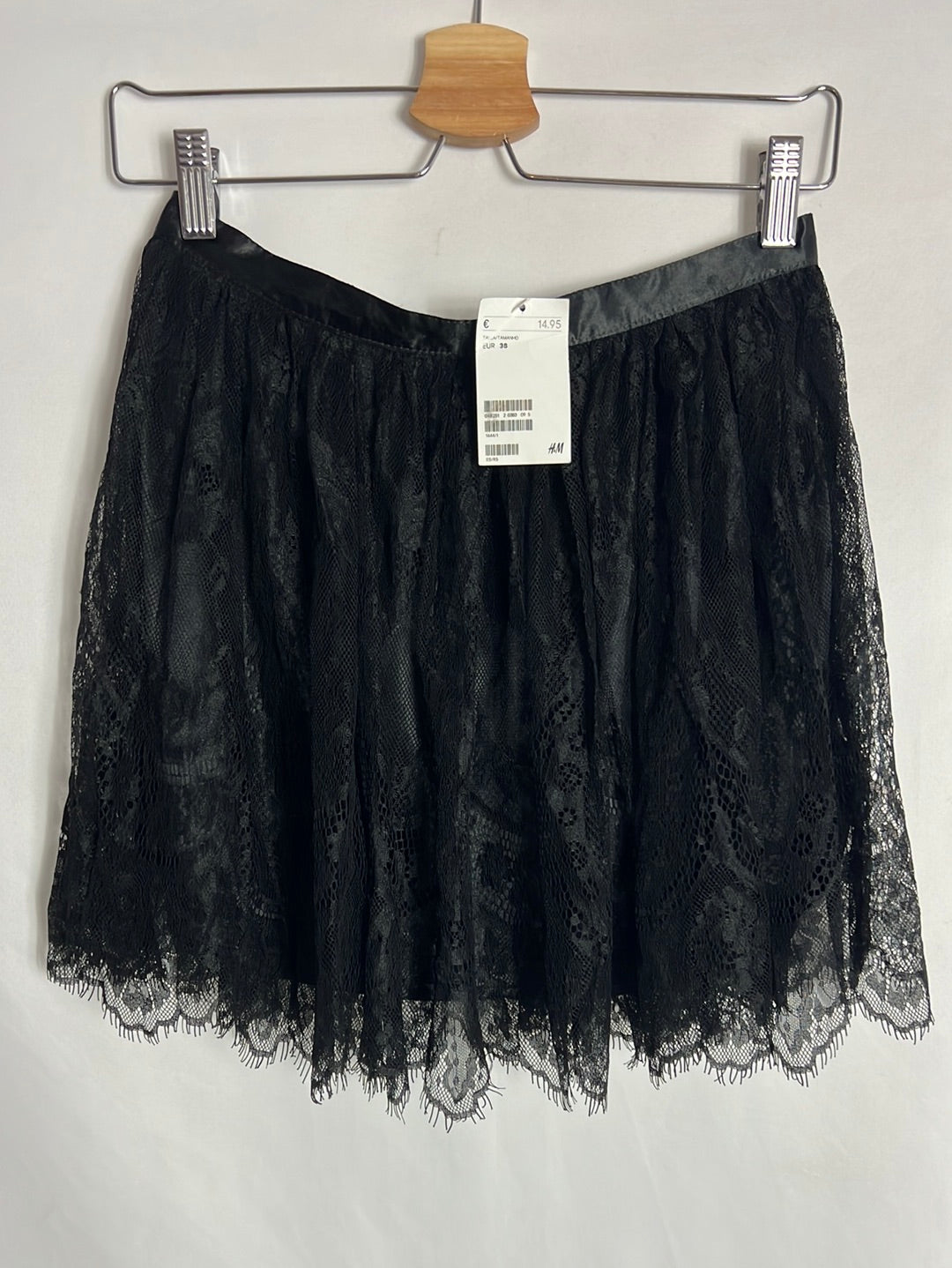 H&amp;M. Short black lace skirt. Size 38