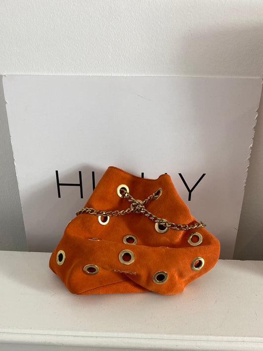 CUPLÉ. Bolso piel naranjas