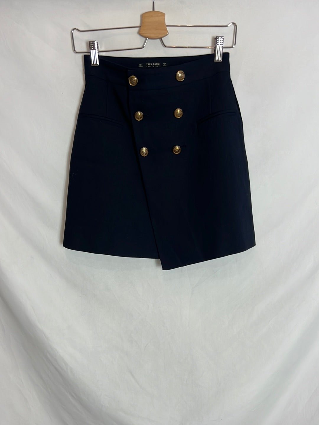 ZARA. Falda corta azul botones. T S