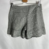 MORGAN. Pantalones cortos efecto falda gris hilos plateados. T 36