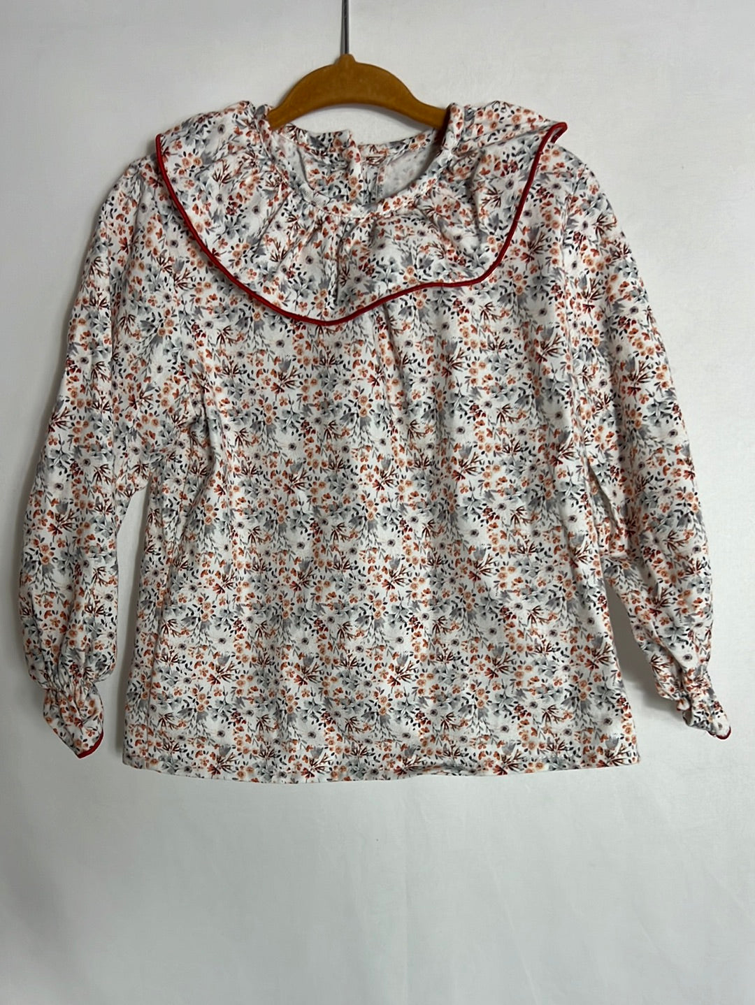 REGINA FOR KIDS. Blusa flores mini tonos naranjas. T 3 años