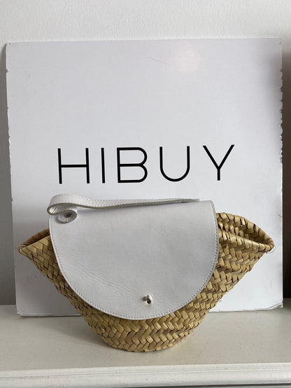 LATOUCHE. Raffia bag with white details.