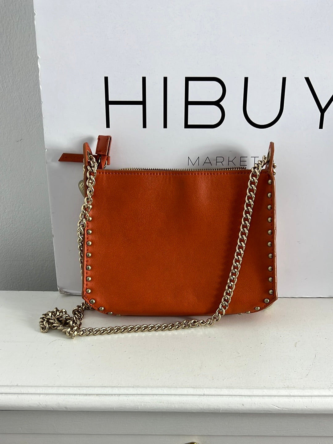 ZARA. Bolso mini naranja tachuelas