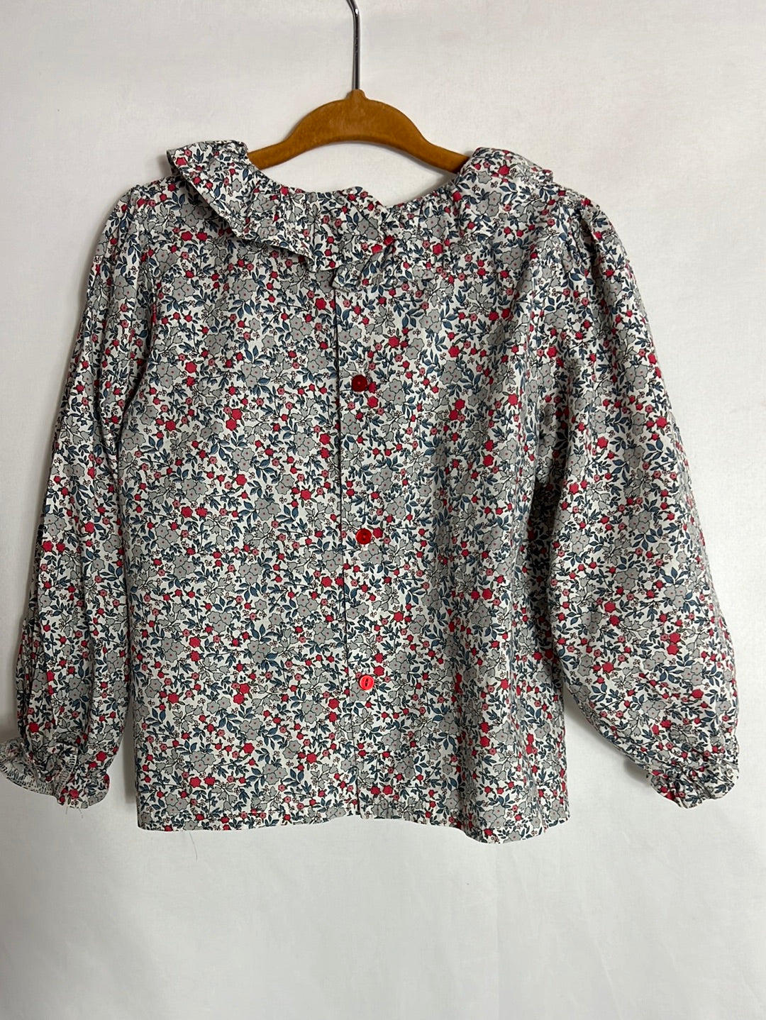 OTRAS. Blusa flores mini azules y rojas. T 3 años