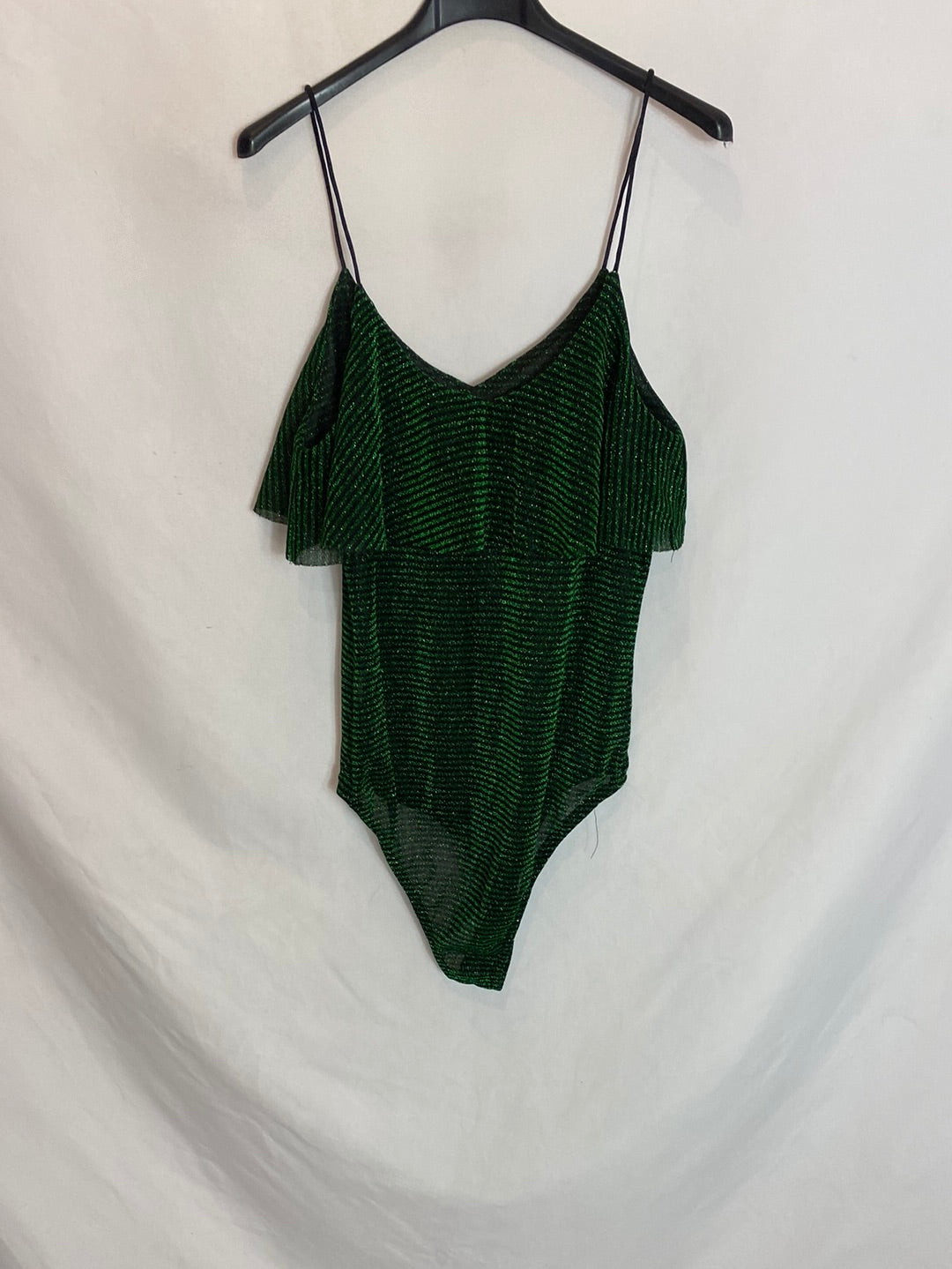 OTHERS. Black bodysuit with green stripes. TS