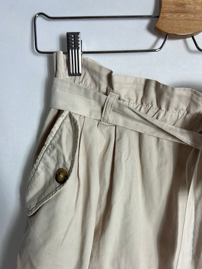 OYSHO. Falda corta beige bolsillos. T S