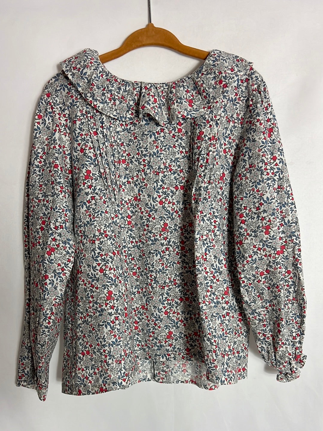 OTRAS. Blusa flores mini azules y rojas. T 6 años