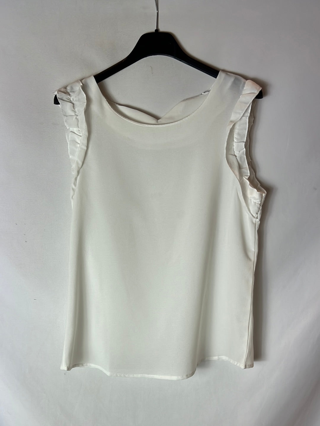 OTHERS. White top with ruffled sleeves. TS