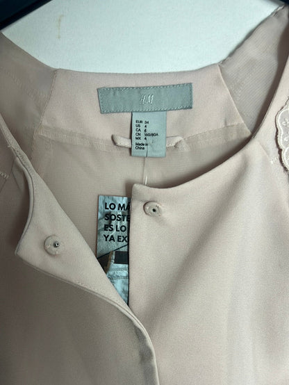 H&M. Blusa /torerita detalle manga color nude. T 34