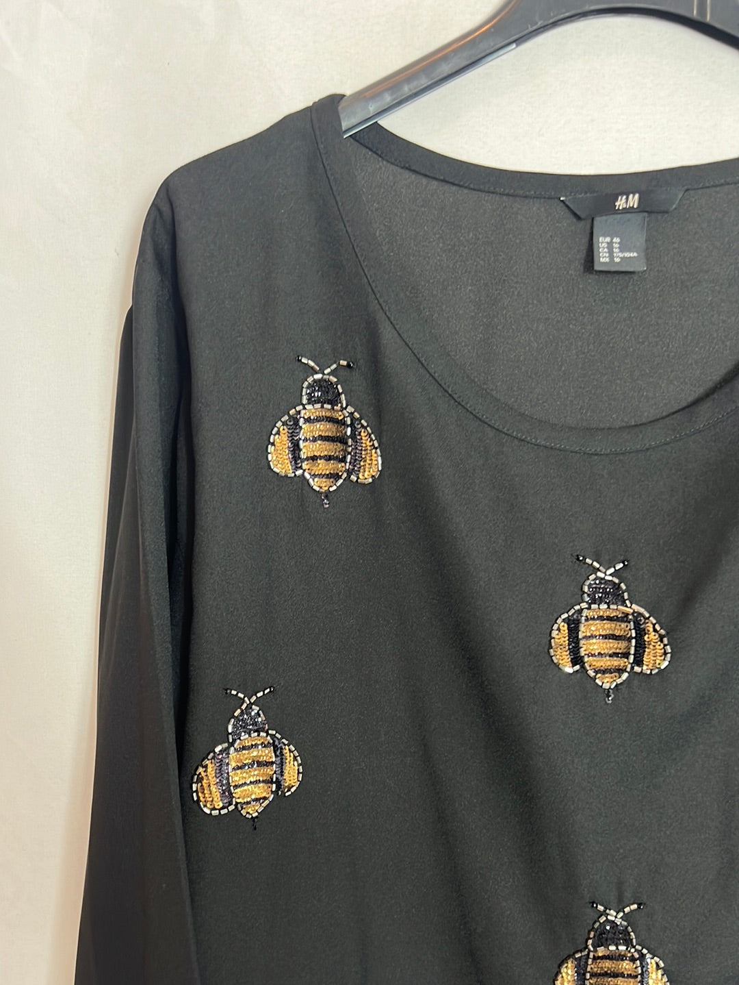 H&amp;M. Black beaded insect blouse. Size 46 (XL)